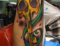 /uploads/tattoos/previews/skeleton key color arm tattoo
