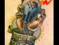 /uploads/tattoos/previews/Memorial tattoo of hand holding a CB radio receiver