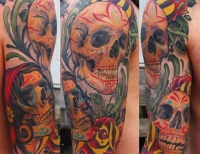/uploads/tattoos/previews/Muertos painted skulls and traditional ish roses and filigree color arm half-sleeve