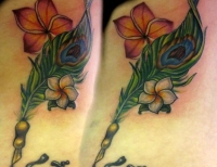 /uploads/tattoos/previews/Frangipani (otherwise known as Plumaria) flowers with a peacock quill
